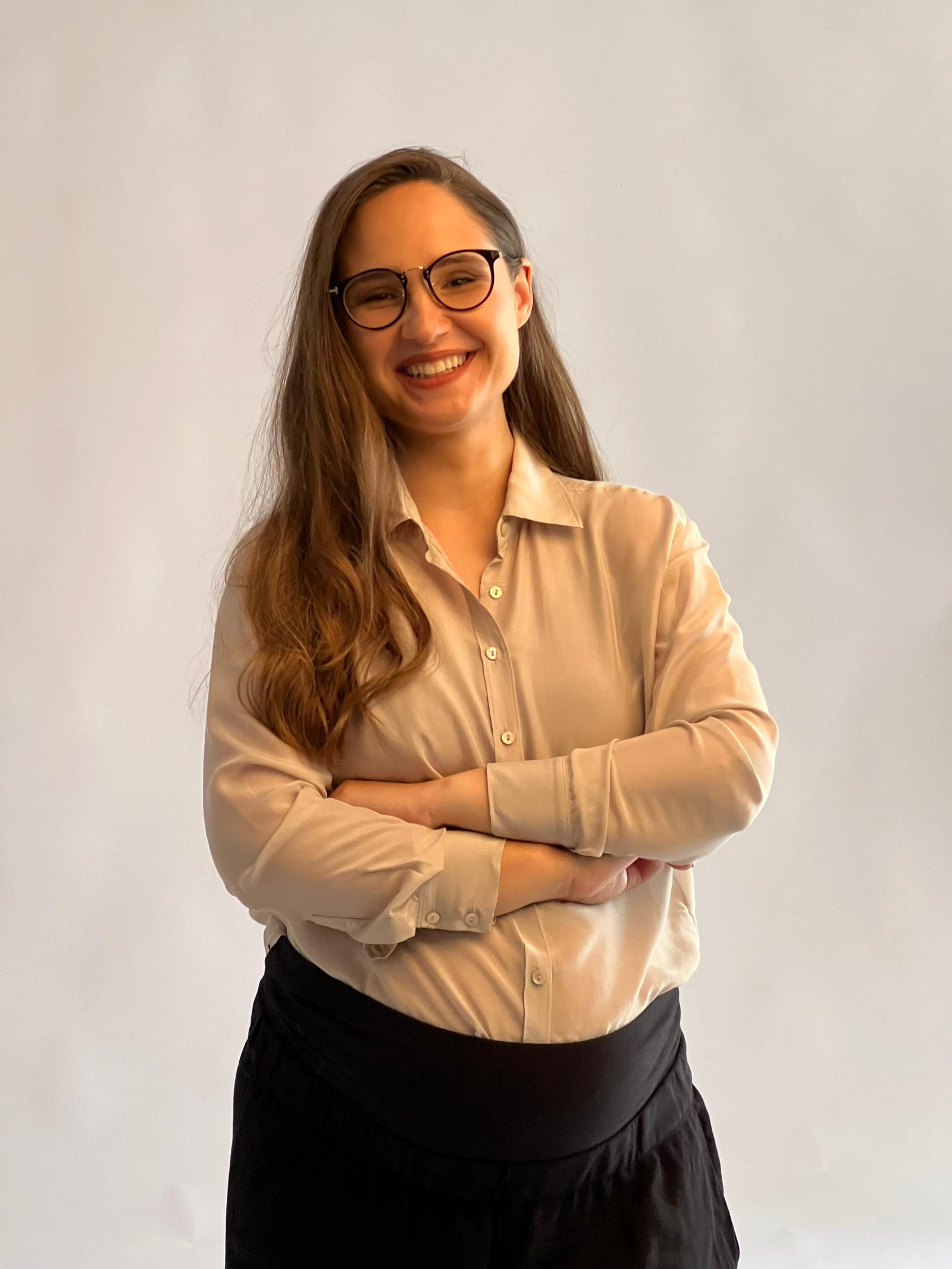 Viktorija Garanča, smiling with arms crossed